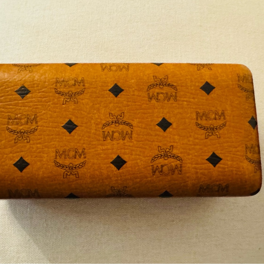 MCM sunglasses in a Cognac Visetos Monogram sunglasses, beautiful leather case.